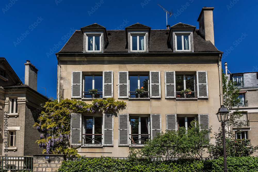 Picturesque old house on the Montmartre hill. Paris. France. Montmartre area is most popular destinations in Paris.