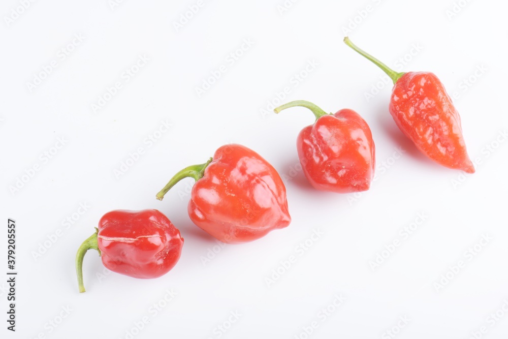 Fresh habanero peppers, isolated on white Fresh habanero peppers, isolated on white