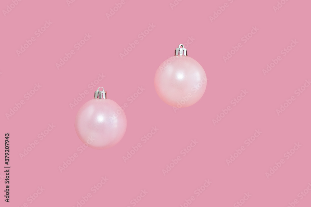 pink Christmas balls, Christmas toys on a pink background. Place for text. simple design. mock-up pink Christmas balls, Christmas toys on a pink background. Place for text. simple design. mock-up