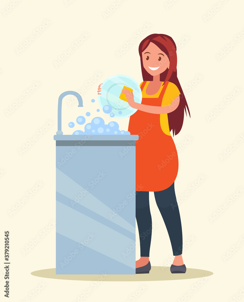 Housewife. The woman wearing in an apron is washing dishes. Housewife. The woman wearing in an apron is washing dishes.