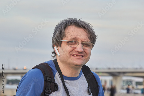 portrait of an adult male face, strabismus or exotropia