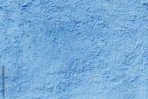 Abstract rough blue texture. Architectural abstract background. Plastered building wall.