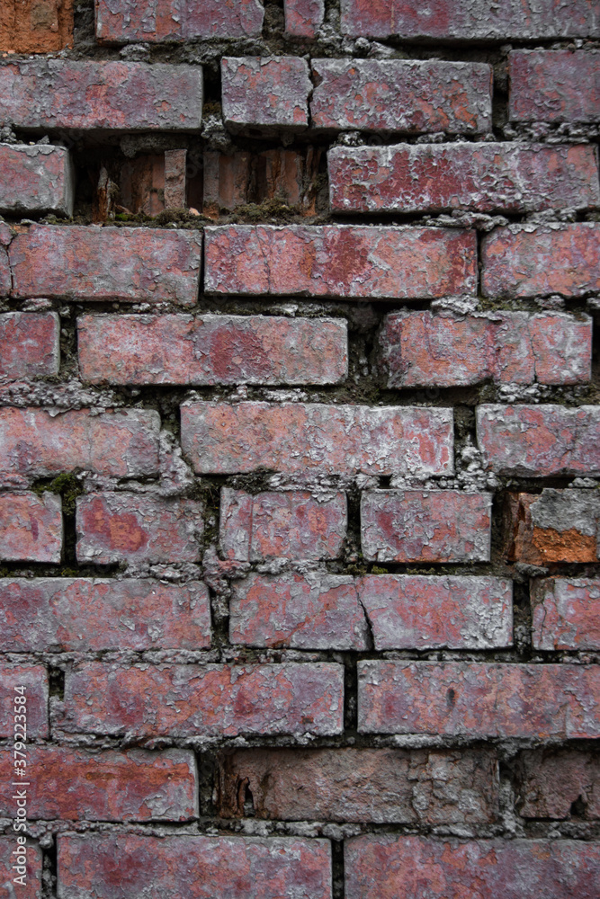 Fototapeta premium old broken brick wall red