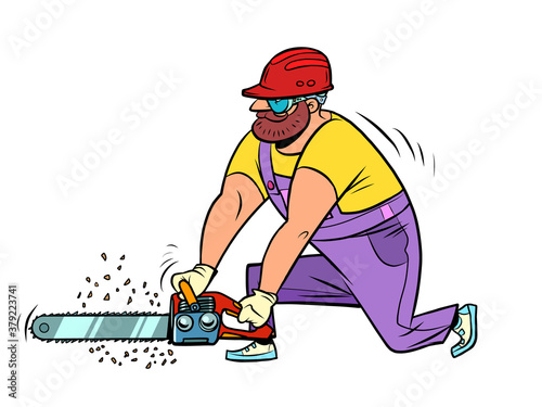 A carpenter with a chain saw