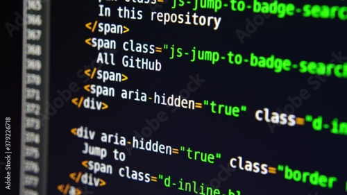The program text moves on the computer screen. Macro shooting of computer display