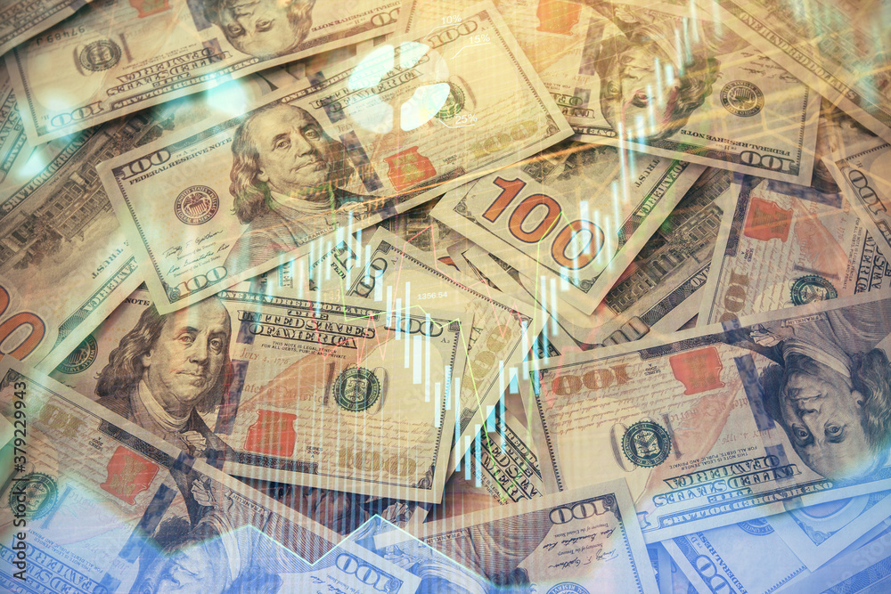 Multi exposure of forex chart drawing over us dollars bill background. Concept of financial success markets. Multi exposure of forex chart drawing over us dollars bill background. Concept of financial success markets.