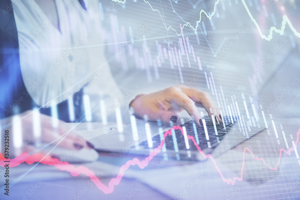 Double exposure of businesswoman hands typing on computer and forex graph hologram drawing. Financial analysis concept. Double exposure of businesswoman hands typing on computer and forex graph hologram drawing. Financial analysis concept.