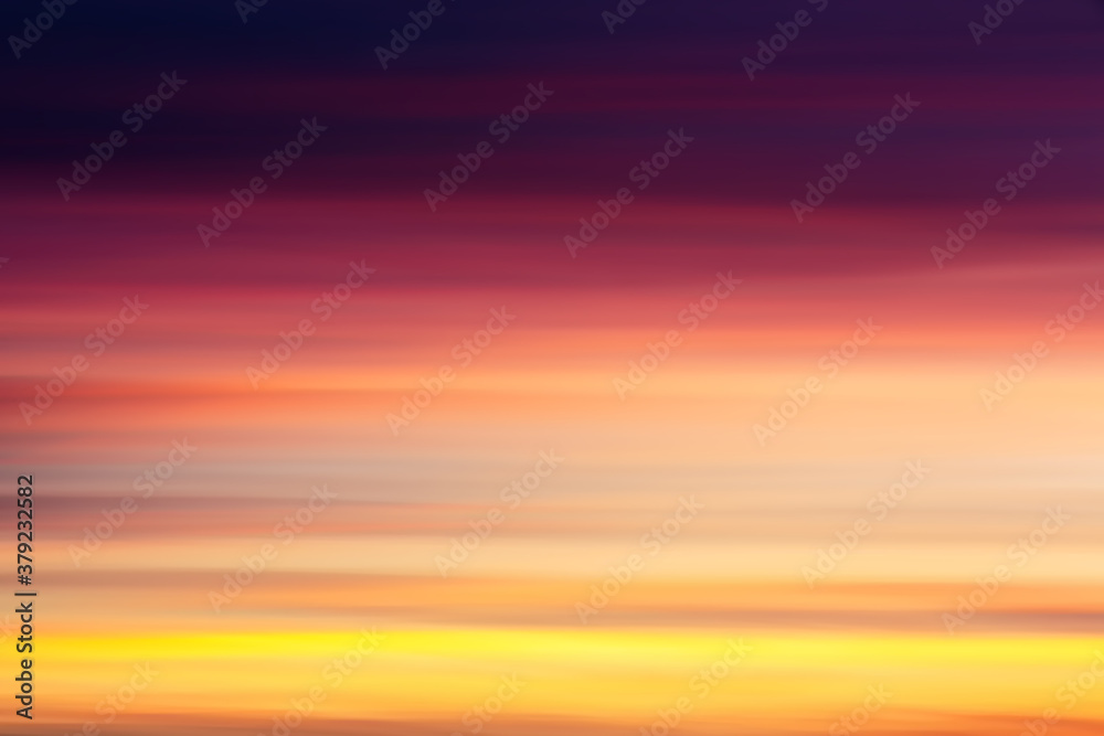 Colorful dramatic sunset shooted with horizontal camera motion. Abstract background