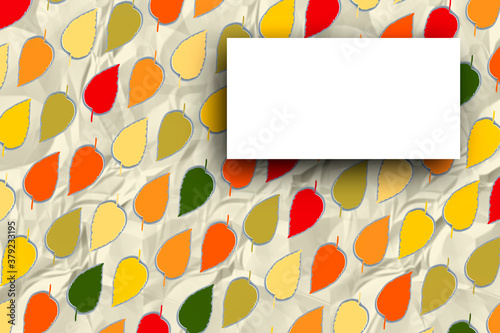 Multi colored leaves background representing autumn with card