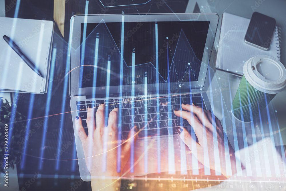 Double exposure of woman hands typing on computer and forex chart hologram drawing. Stock market invest concept. Double exposure of woman hands typing on computer and forex chart hologram drawing. Stock market invest concept.