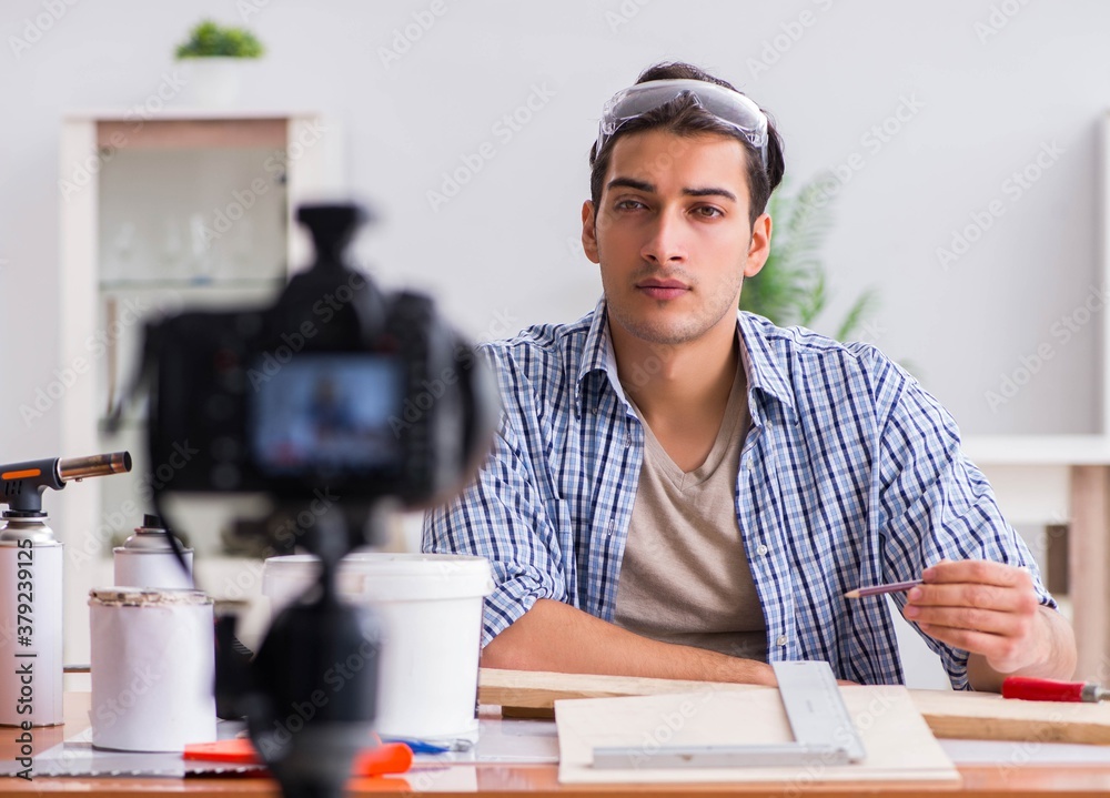 DIY blogger recording video of woorworking hobby DIY blogger recording video of woorworking hobby