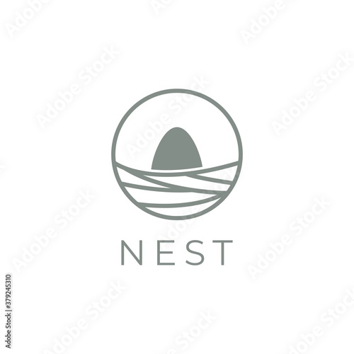 Nest logo design vector template.Nest with egg symbol illustration