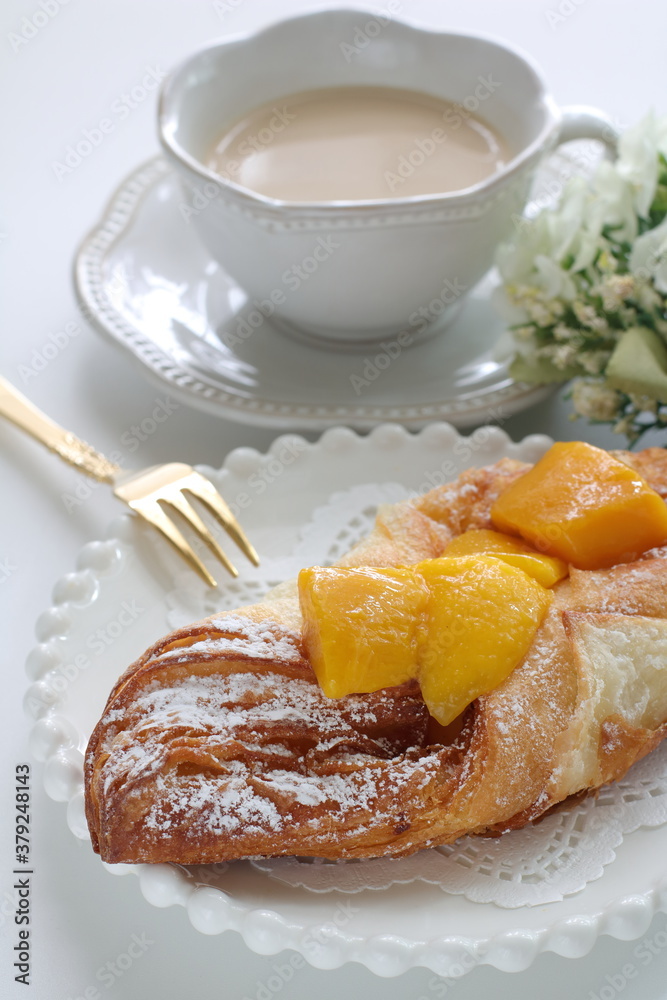 mango pastry and drink for breakfast
mango pastry and drink for breakfast