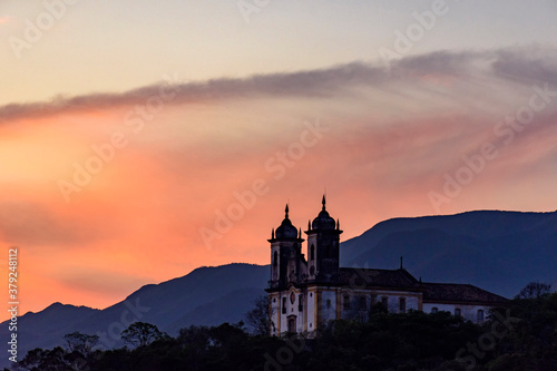 Old and historic 18th century church with its facade illuminated by sunset in the city of Ouro Preto, Minas Gerais, Brazil © Fred Pinheiro