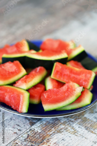 Watermelon peels in a plate. Selective focus. Macro.