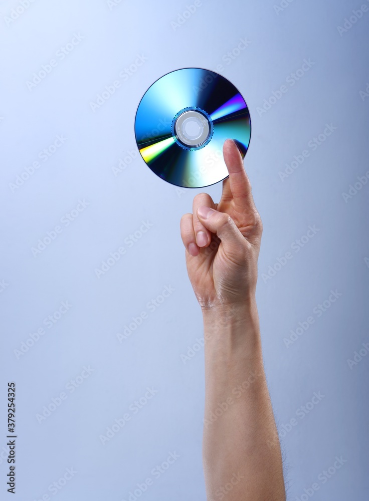 hand holding cd