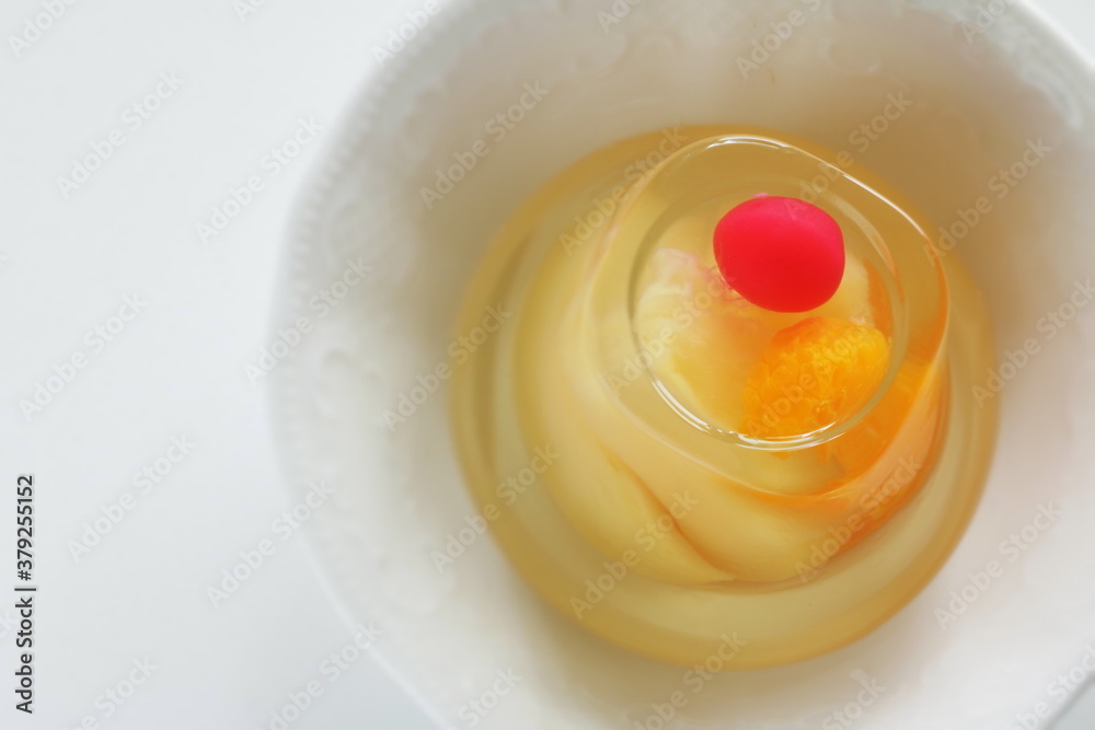 Mixed fruit Jelly in bowl on white background with copy space Mixed fruit Jelly in bowl on white background with copy space