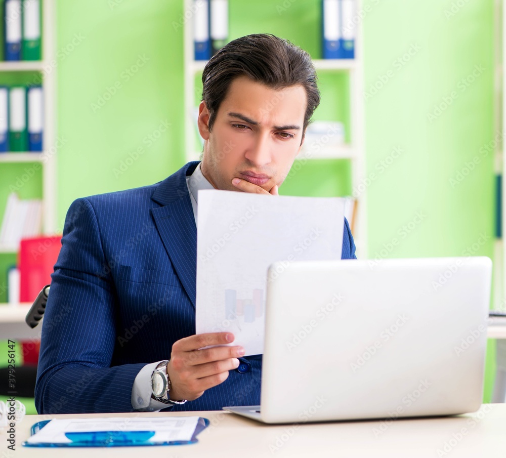 Businessman working in the office Businessman working in the office