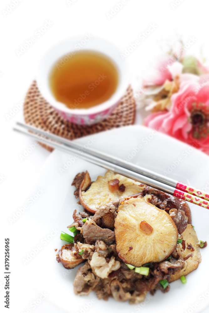 Chinese food, Shiitake mushroom and beef stir fried with green onion on top Chinese food, Shiitake mushroom and beef stir fried with green onion on top