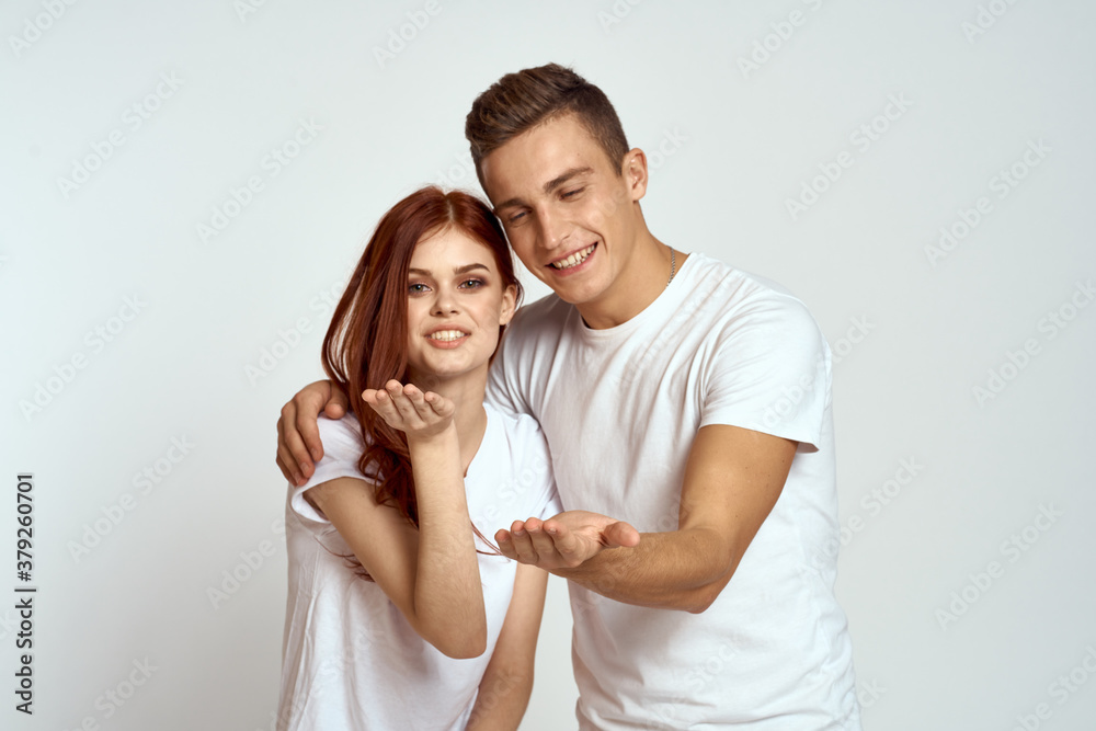 Portrait of man and woman family love emotions light background close-up cropped view