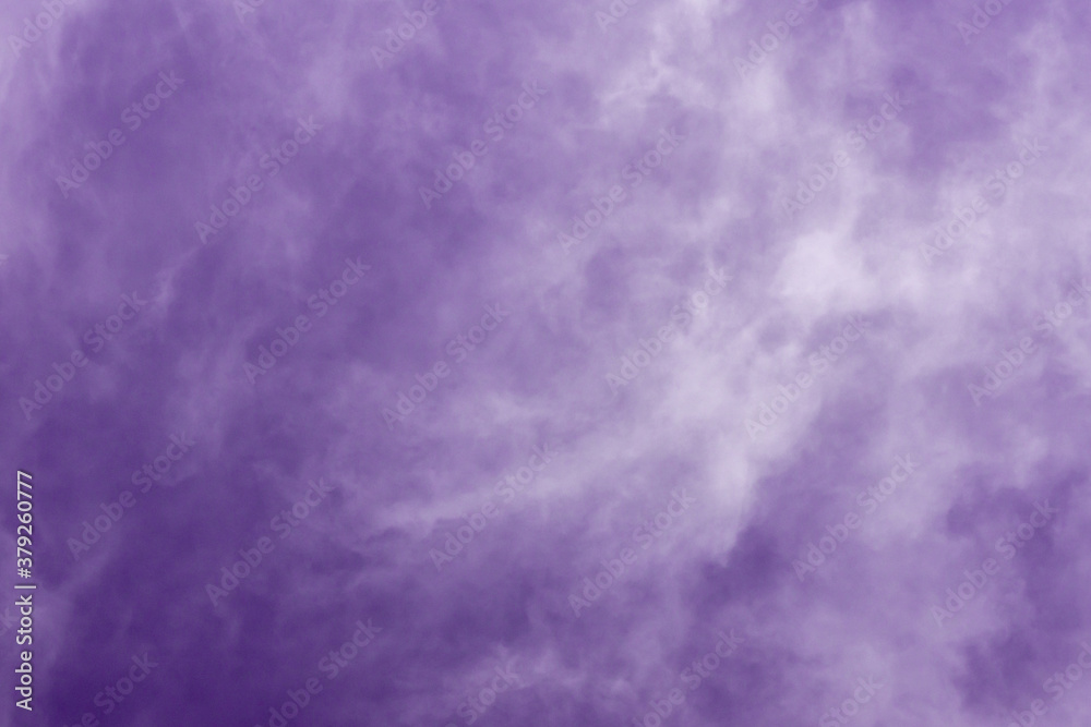 transparent clouds in the sky toned purple