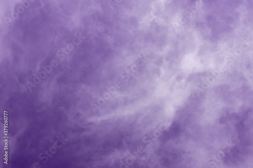 transparent clouds in the sky toned purple