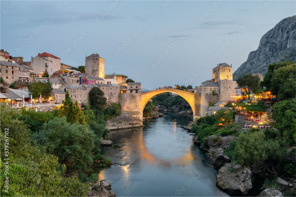 Stari Most bridge at twilight in old town of Mostar, BIH