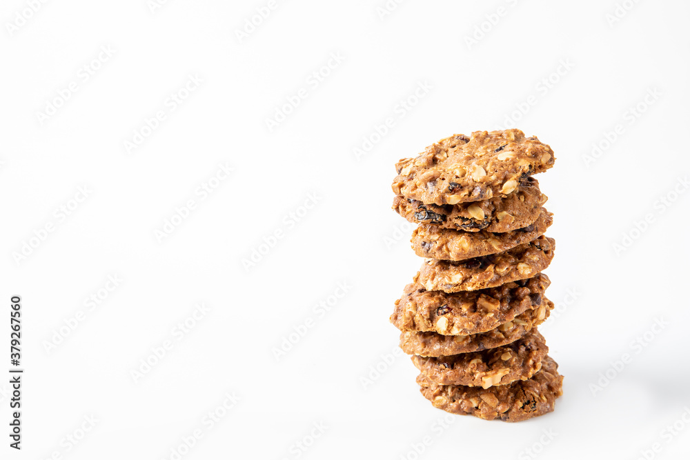 Homemade tasty oatmeal cookies with raisins, dried cranberry and Himalayan mango seeds. Healthy snack concept. Sweet dessert. Space for text. Homemade tasty oatmeal cookies with raisins, dried cranberry and Himalayan mango seeds. Healthy snack concept. Sweet dessert. Space for text.