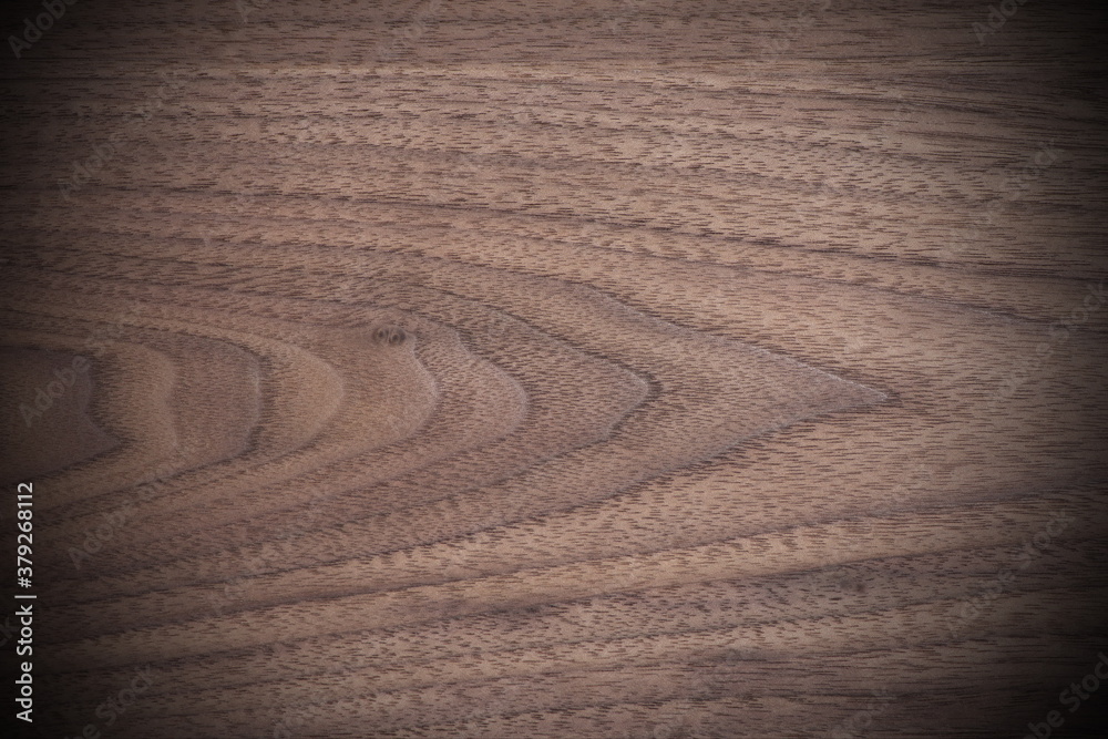 Naklejka premium Walnut Grain Background Texture with Vignette