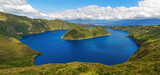 Panorama of the Cuicocha crater lake or lagoon along the Cuicocha hike with Wolf and Yerovi island, Cotacachi Cayapas reserve, Otavalo, Ecuador.