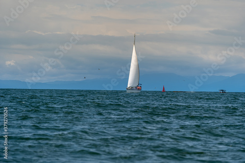 Beautiful and peaceful sailboat sailing in the middle of the Pacific Ocean 