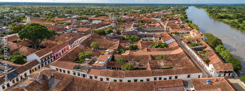 Panoramic aerial view of the historic town Santa Cruz de Mompox and river in sunlight, Colombia, World Heritage