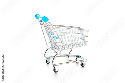 Products cart. Food shopping basket for retail market. Empty trolley cart for supermarket isolated on white background. Creative idea for shopping online, summer sale, supermarket.