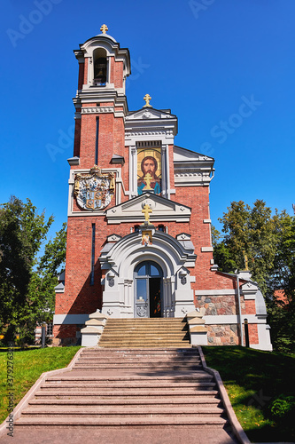 A small old Church. Outside view of the old red brick Church.