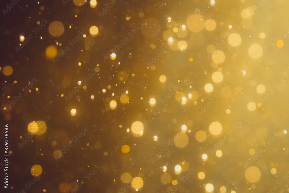 Dark Abstract Gold bokeh sparkle on black Dark Abstract Gold bokeh sparkle on black