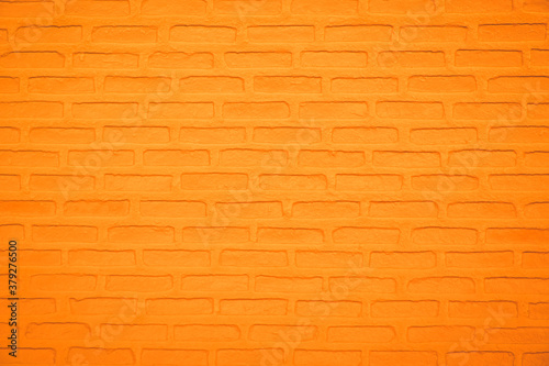 Abstract weathered texture stained old stucco light clean color and aged paint concrete orange brick wall background in the room. Grunge decorative pattern on the street.