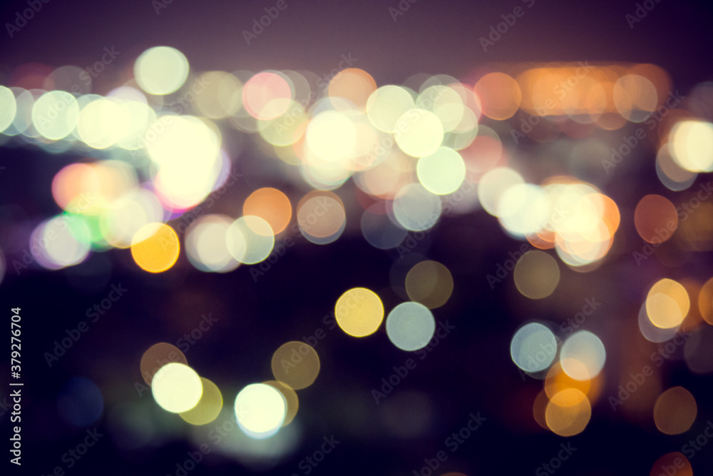 Fototapeta premium Blur defocus bokeh of light in the city with dark
