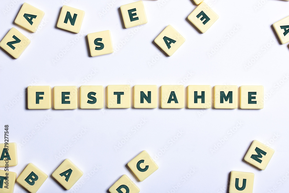 Das Wort Festnahme mit Buchstaben darum und weißer Hintergrund Das Wort Festnahme mit Buchstaben darum und weißer Hintergrund