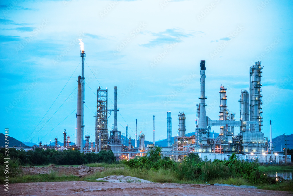 Oil refinery gas petrol plant industry with crude tank, gasoline supply and chemical factory. Petroleum barrel fuel heavy industry oil refinery manufacturing factory plant. Refinery industry concept Oil refinery gas petrol plant industry with crude tank, gasoline supply and chemical factory. Petroleum barrel fuel heavy industry oil refinery manufacturing factory plant. Refinery industry concept