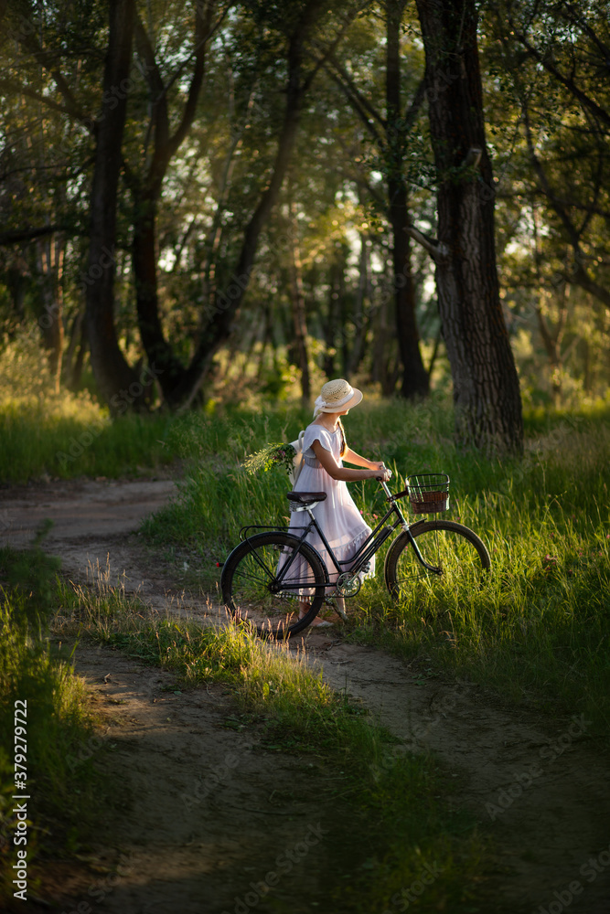 Fototapeta premium girl in green summer forest