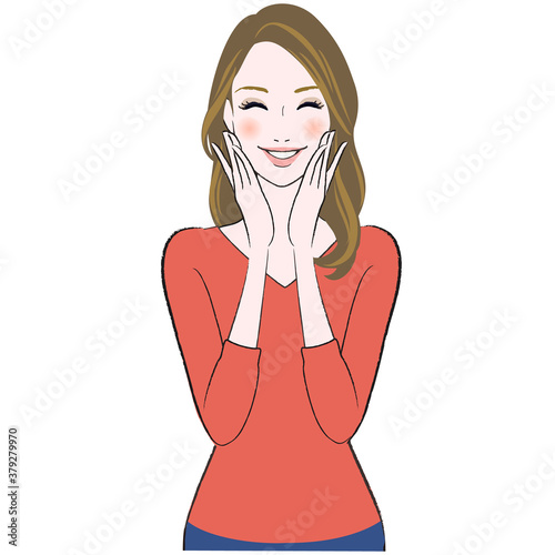 A happy beautiful woman smiling and touching her face