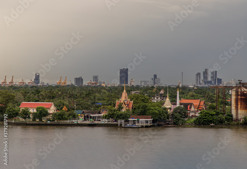 Bangkok, thailand - Sep 20, 2020 : Aerial view on green area of Bang kachao lung and with Chao Phraya River. Beautiful nature. Selective focus. photo