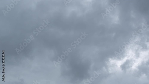 Sky with dark storm clouds. Time lapse clouds motion flow and growing. Formation of clouds before the storm
