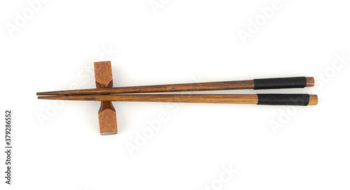 Wooden chopsticks with holder isolated on white background, Japanese style