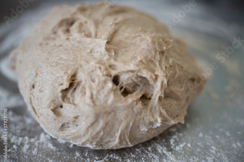 mixing water and whole wheat flour together