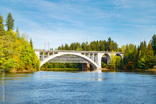 Autumn landscape of bridge and Kymijoki river waters in Finland, Kouvola, Koria photo