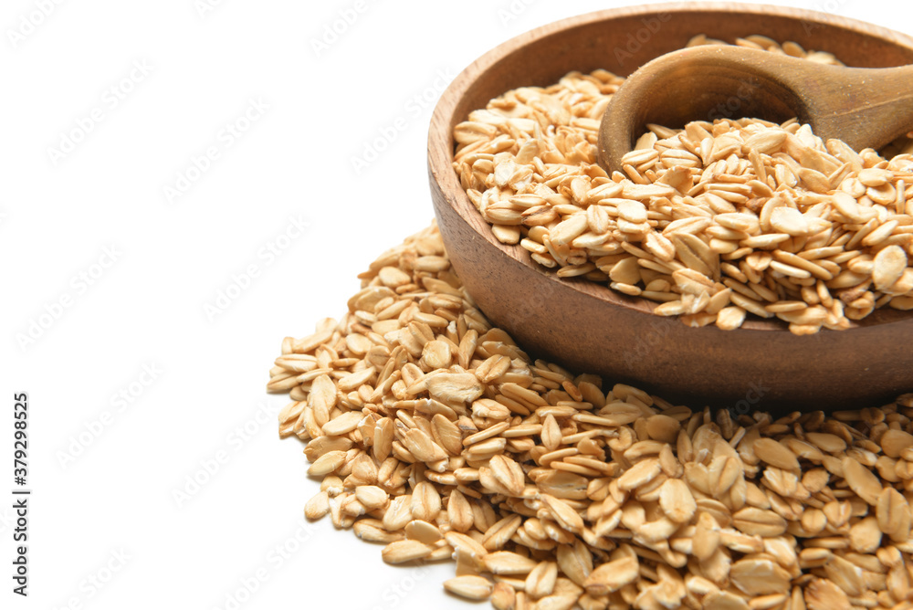 Plate with raw oatmeal on white background Plate with raw oatmeal on white background