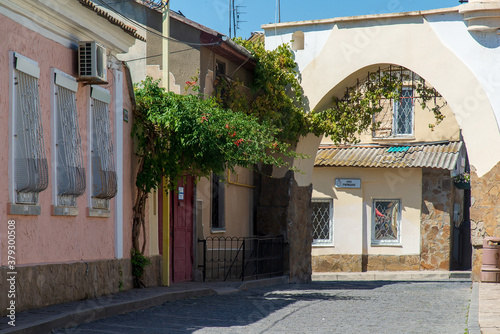Fragment of the street of the old city at a sunny afternoon, Evpatoria, Crimea.