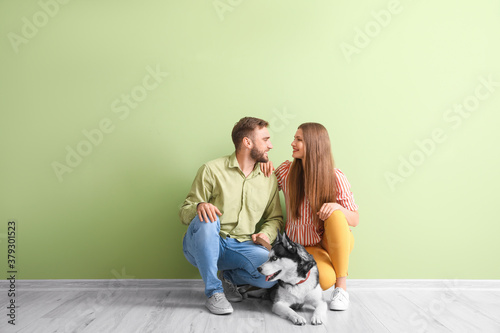 Young couple with cute Husk...