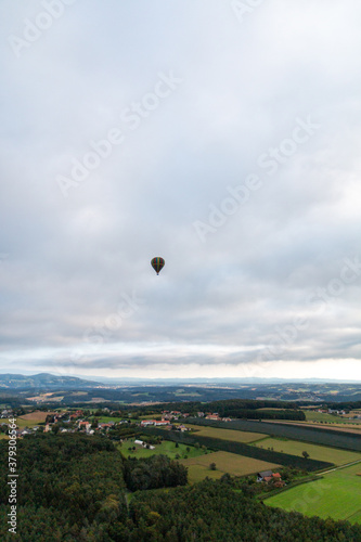 Balloon in the air over the landscape